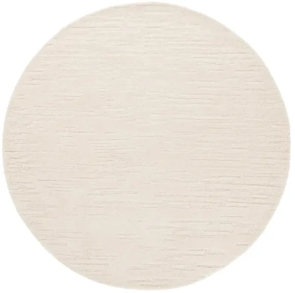 RENEWAL Hand Tufted 6' x 6' Round area rug