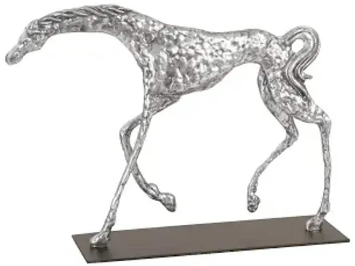 prancing horse sculpture on black metal base, silver leaf