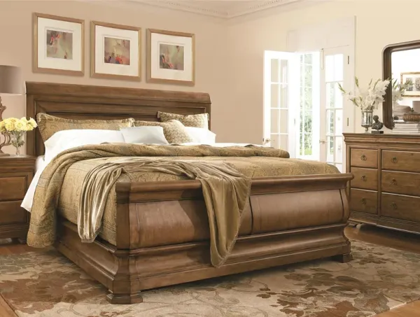 Universal Explore Home New Lou Cognac Louie P's King Sleigh Bed
