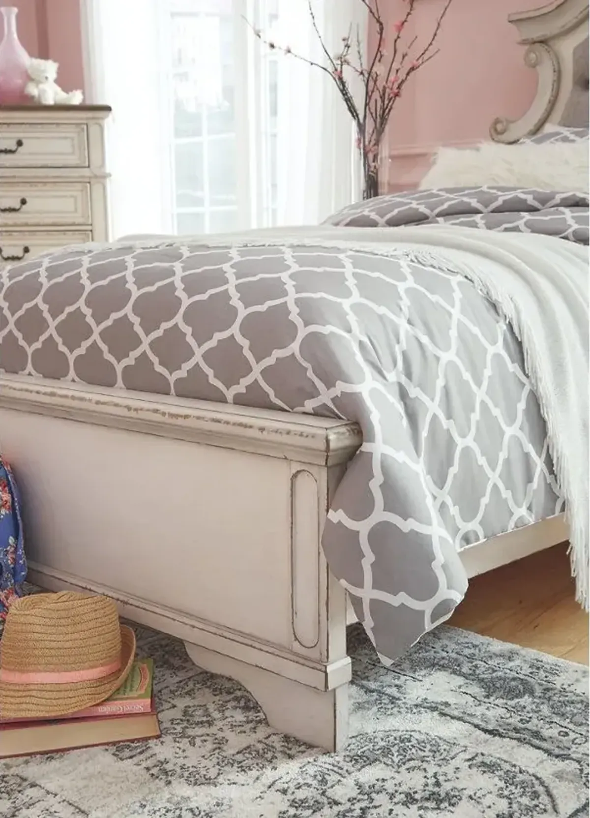 Signature Design by AshleyÂ® Realyn Chipped White Twin Upholstered Panel Bed