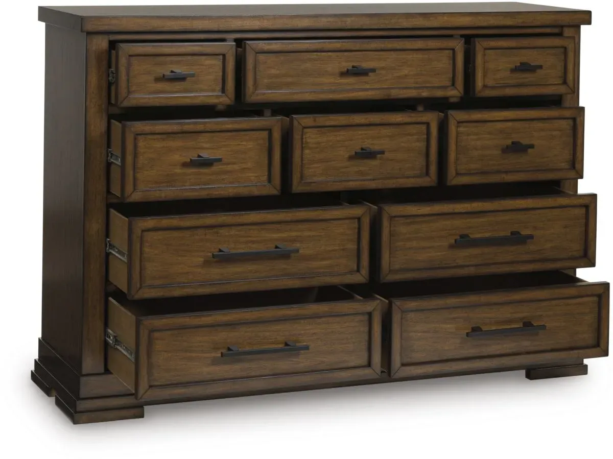 Signature Design by AshleyÂ® Taffenbrook Medium Brown Dresser