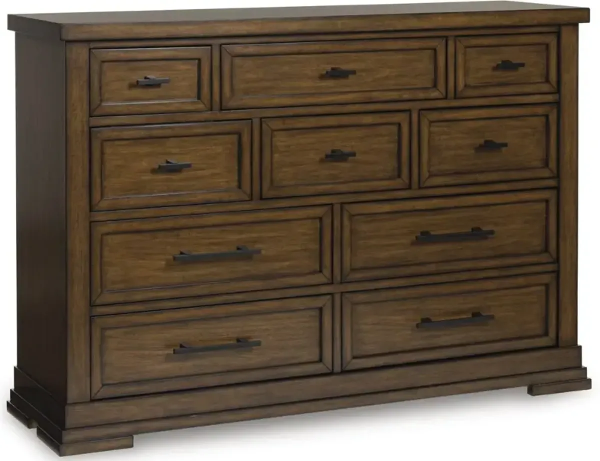 Signature Design by AshleyÂ® Taffenbrook Medium Brown Dresser