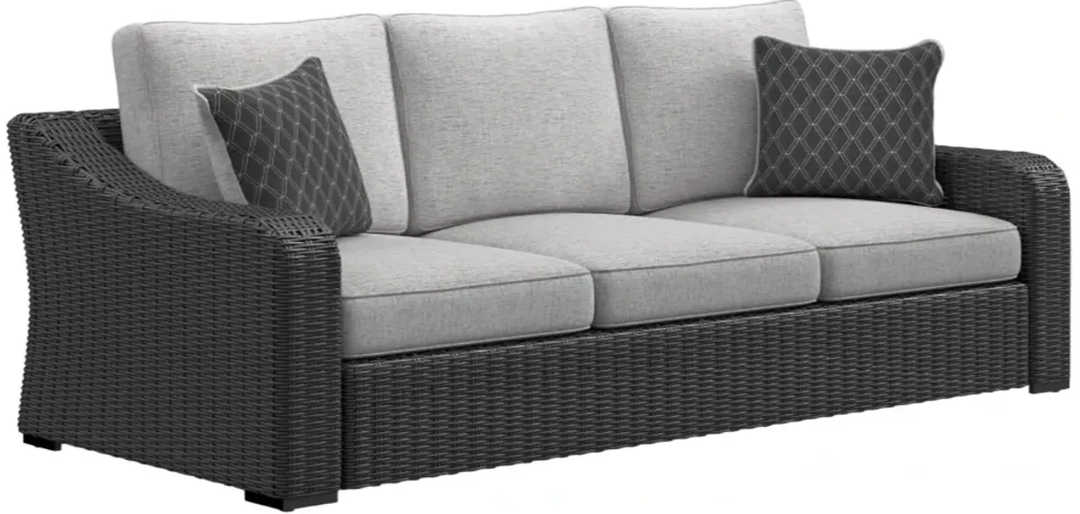 Signature Design by AshleyÂ® Beachcroft Black/Light Gray Fabric/Wicker Outdoor Sofa with Cushion