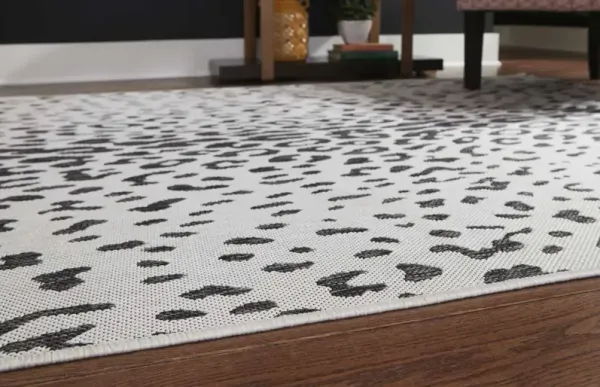 Signature Design by AshleyÂ® Samya Black/White/Gray 5'x7' Medium Area Rug