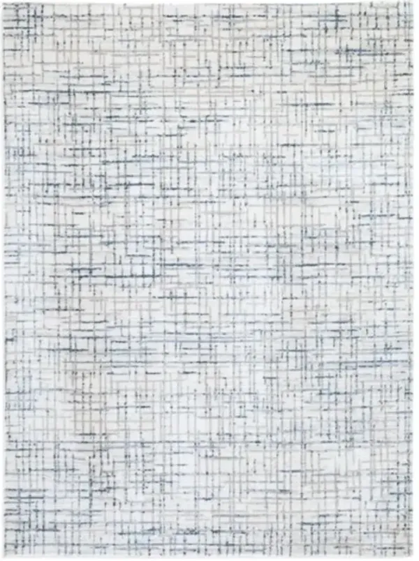 Signature Design by AshleyÂ® Beckfille Blue/Gray/Cream 5' x 7' Rug