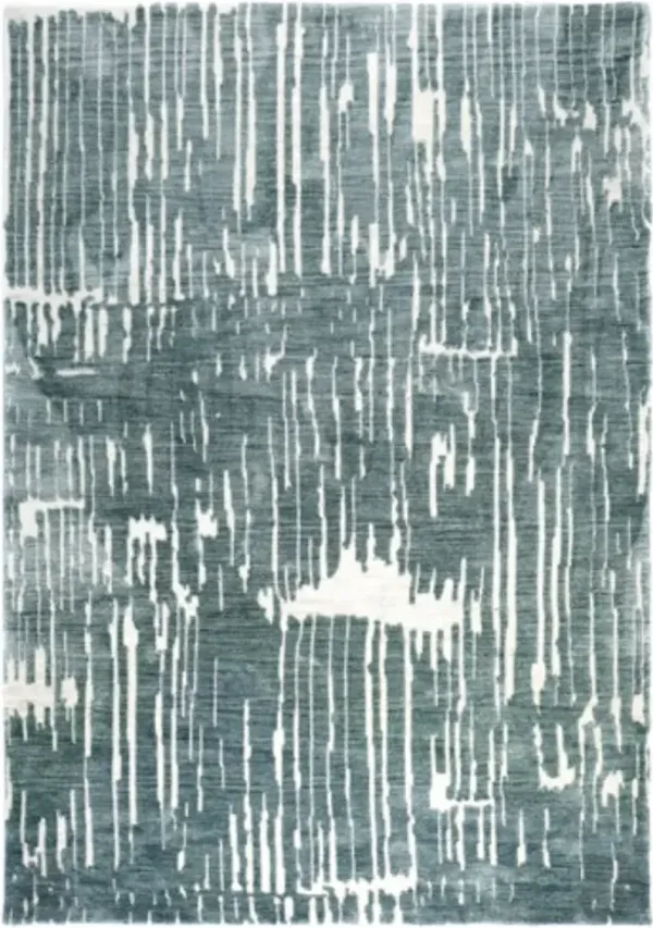 Signature Design by AshleyÂ® Cayworth Teal/White 5'x7' Area Rug