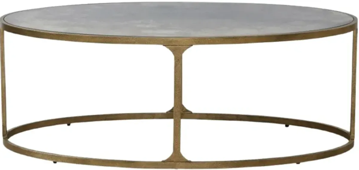 Signature Design by AshleyÂ® Korajane Glass Top Oval Cocktail Table with Antique Gold Base