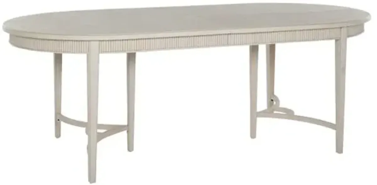 Whitlock 86-106" Oval Extension Dining Table - Distressed Cream - Gabby