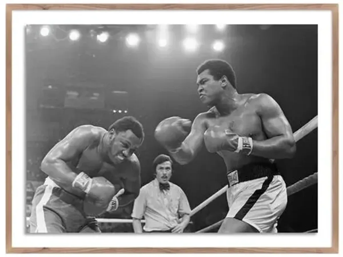 Getty Images - Muhammad Ali Punching Joe Frazier - Brown