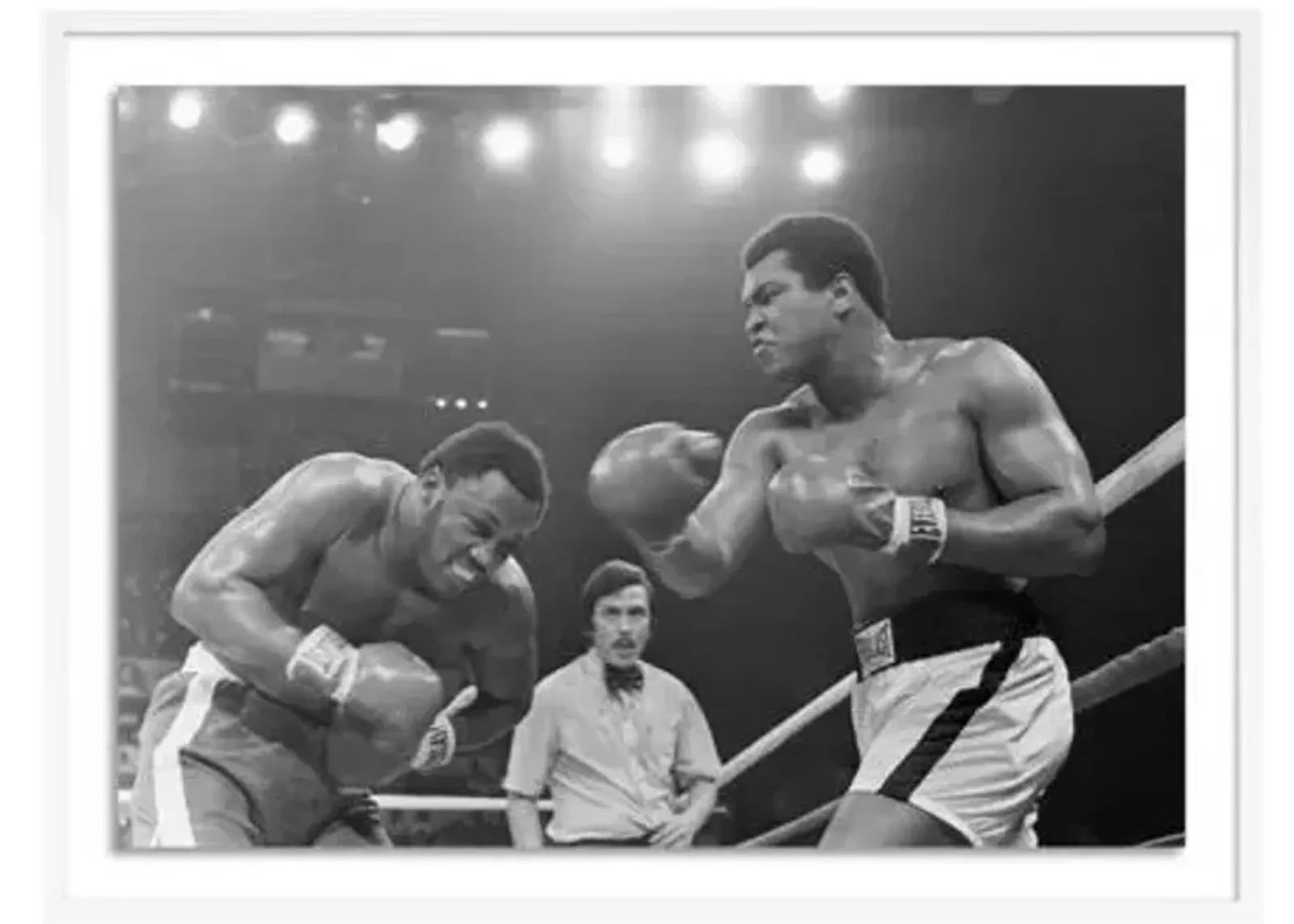 Getty Images - Muhammad Ali Punching Joe Frazier - White