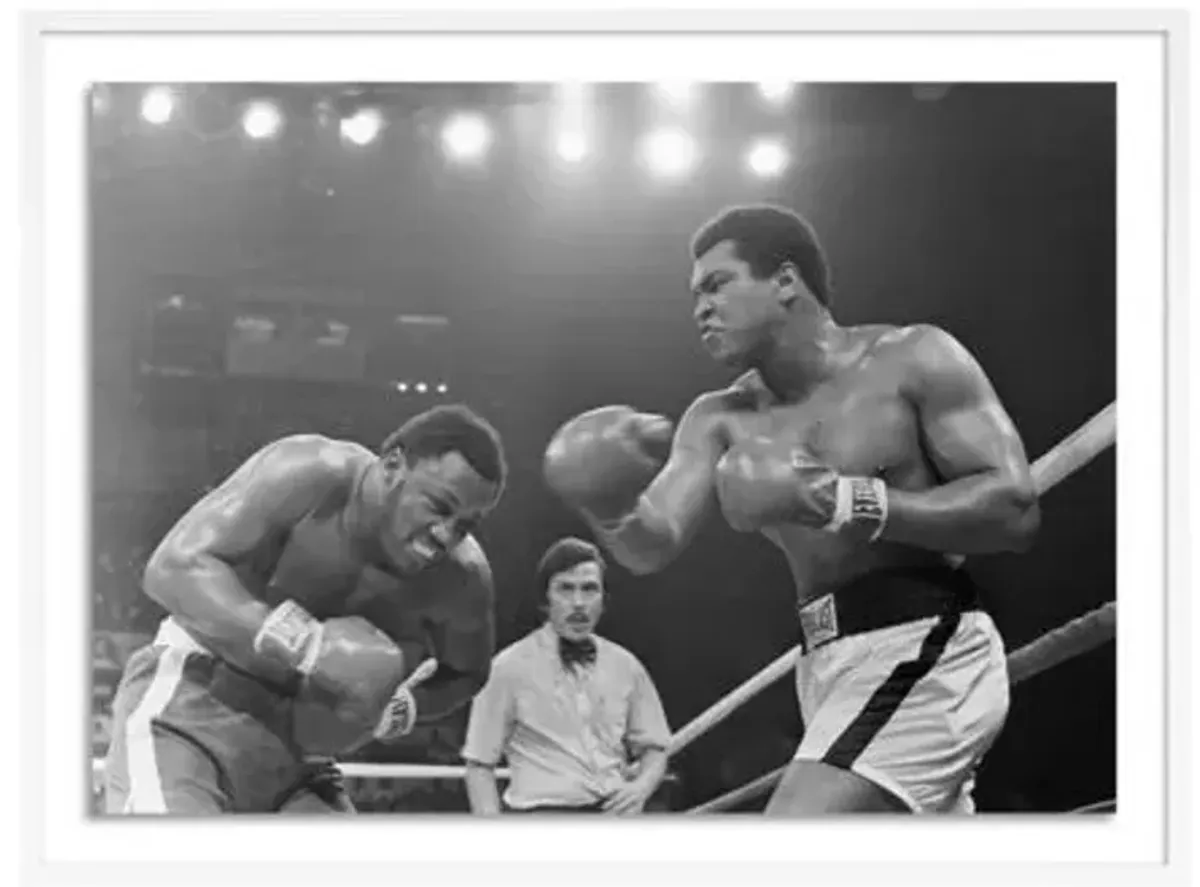 Getty Images - Muhammad Ali Punching Joe Frazier - White