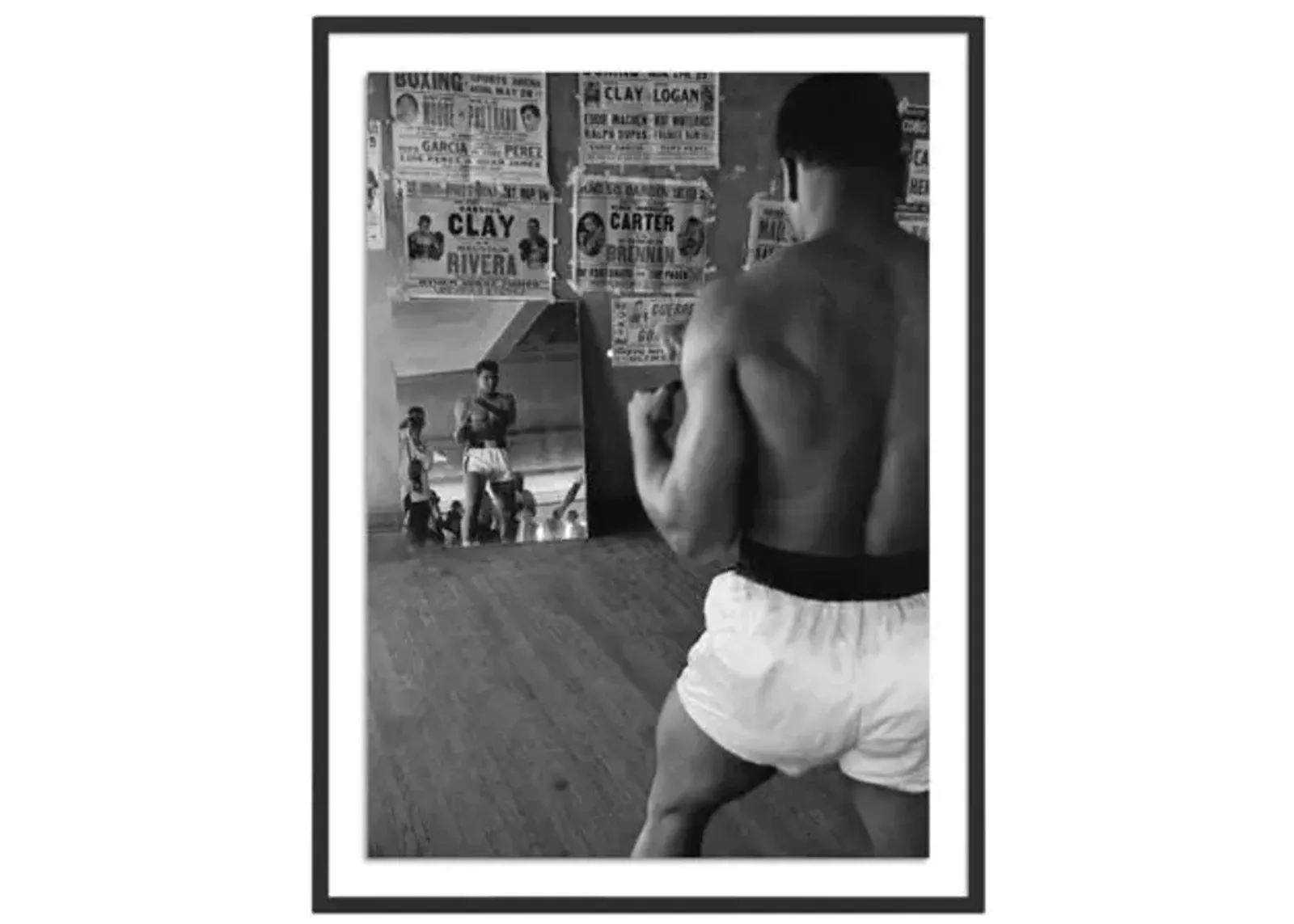 Cassius Clay Watching Himself In A Mirror - Getty Images - Black