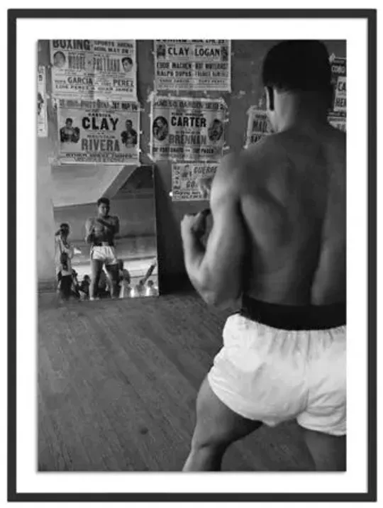 Cassius Clay Watching Himself In A Mirror - Getty Images - Black