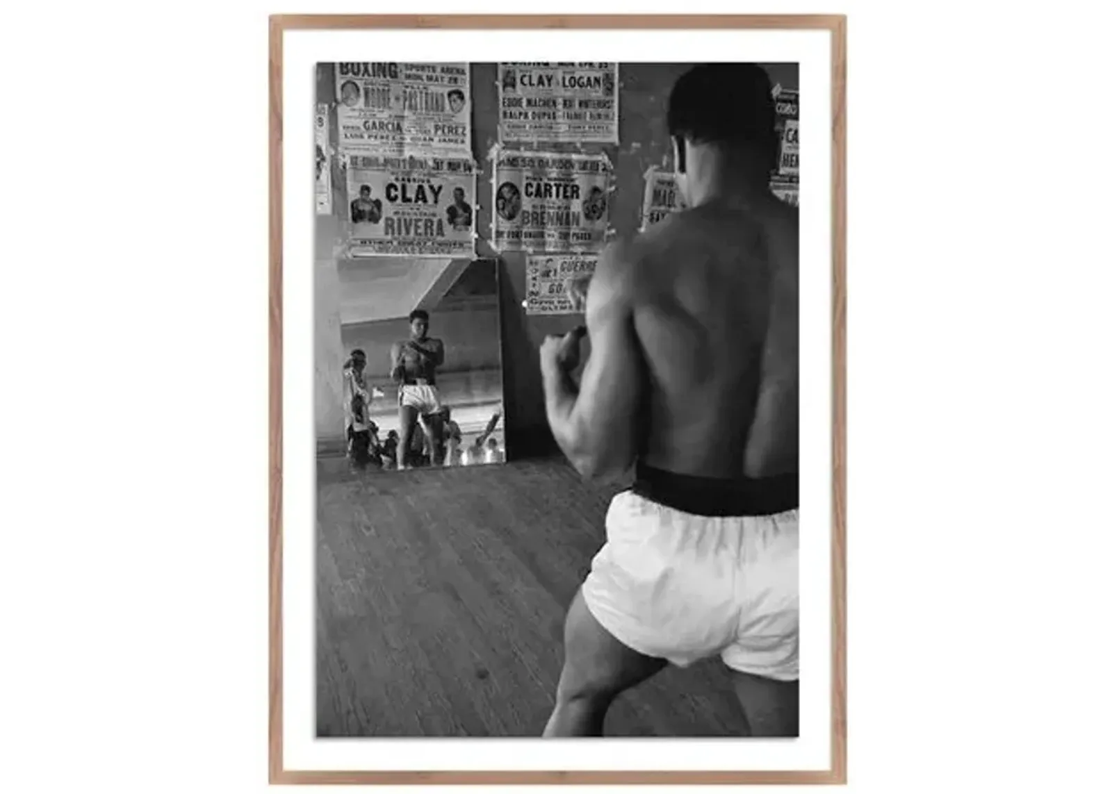 Cassius Clay Watching Himself In A Mirror - Getty Images - Brown