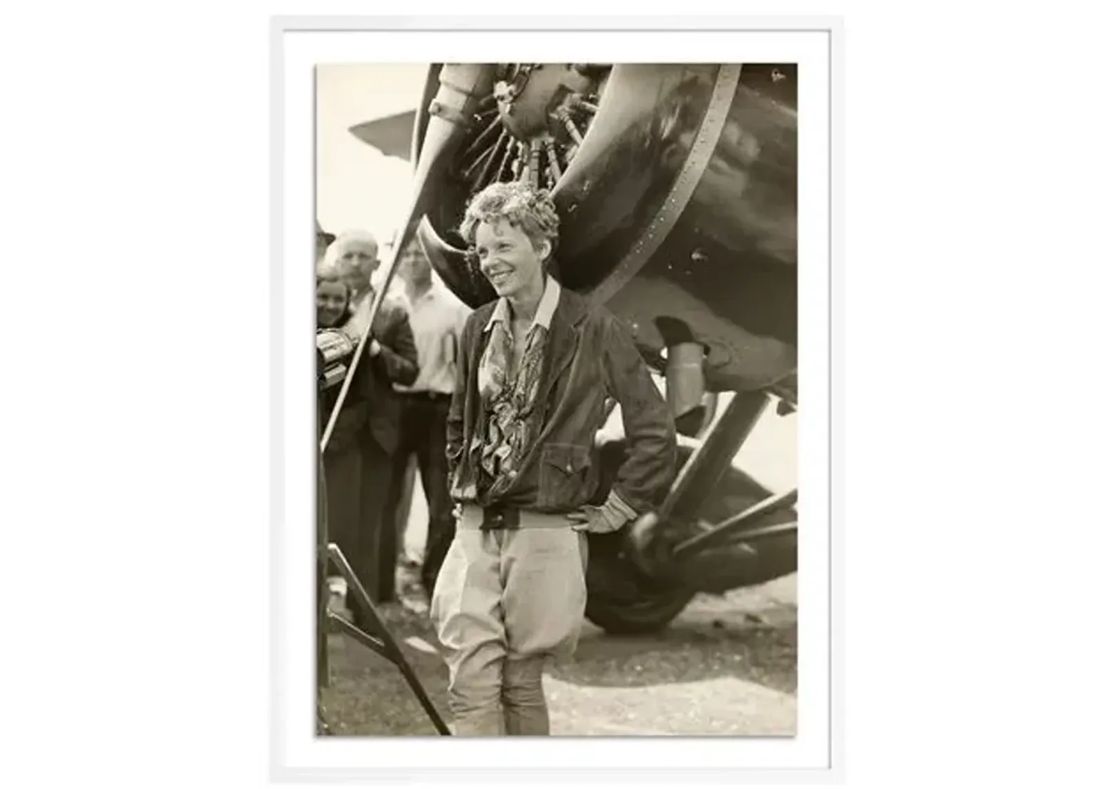 Getty Images - Amelia Earhart Beside Her Plane - White