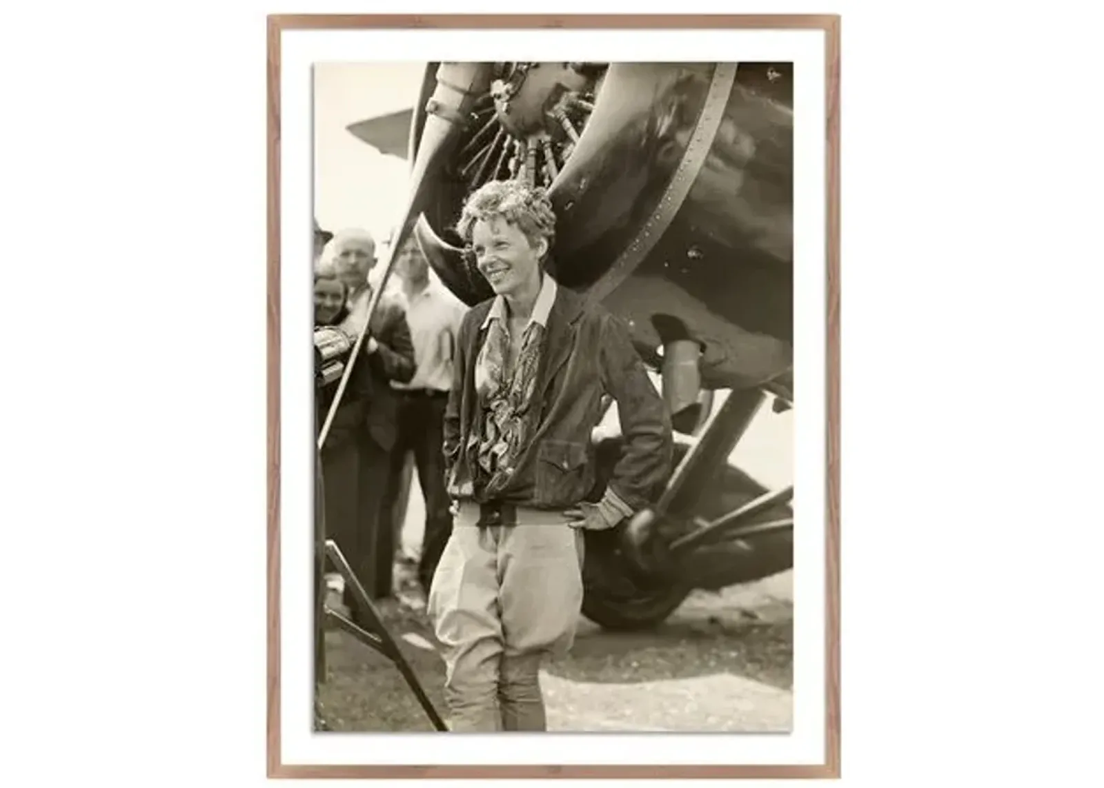 Getty Images - Amelia Earhart Beside Her Plane - Brown