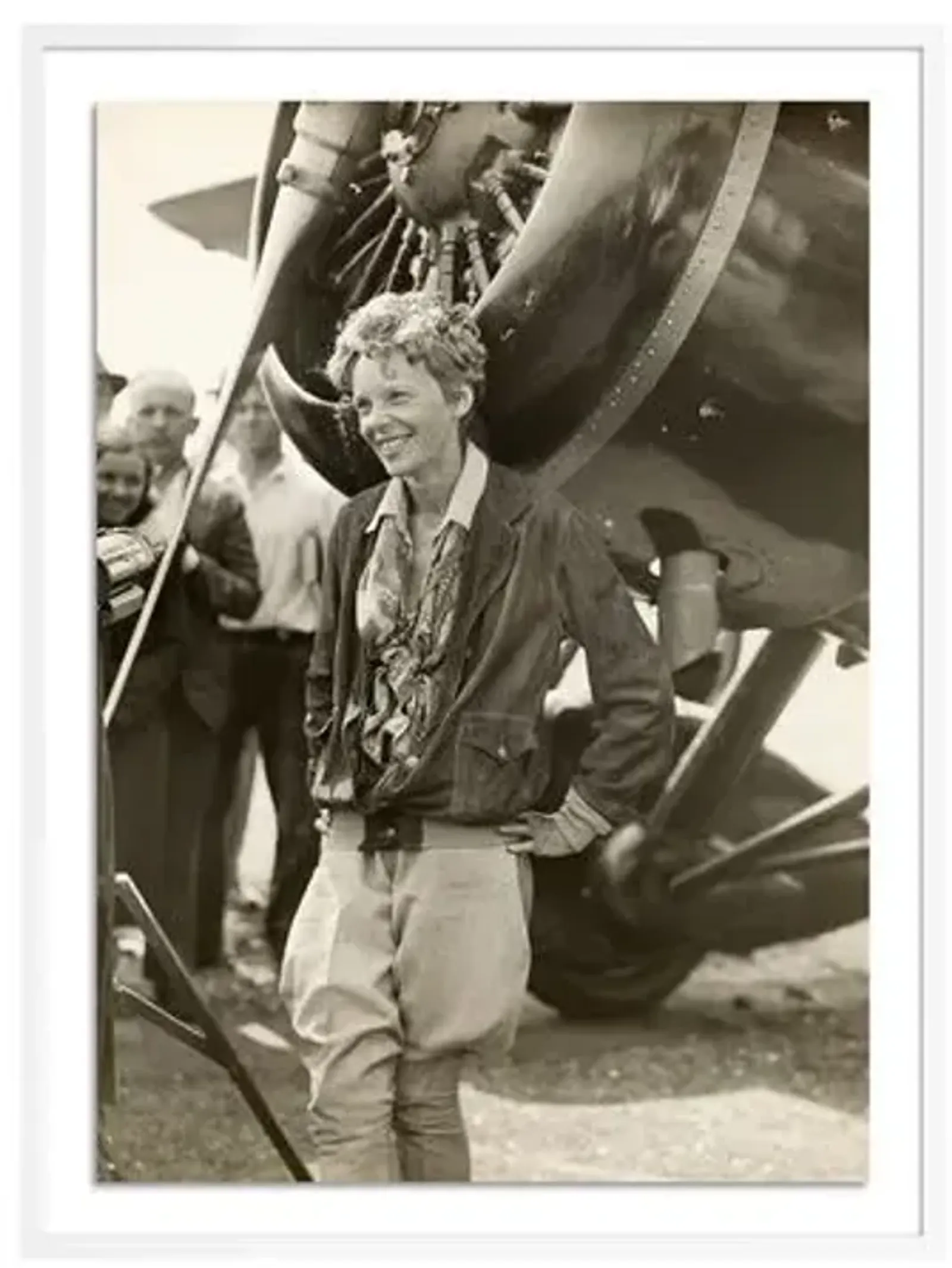 Getty Images - Amelia Earhart Beside Her Plane - White