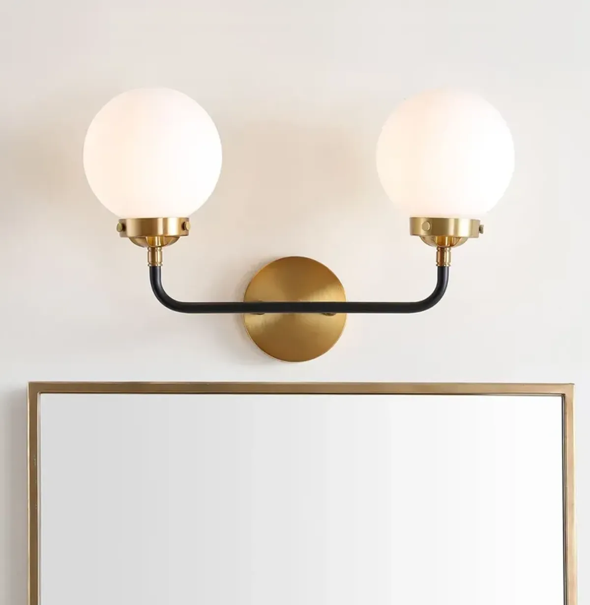 Haldrin Frosted Glass Globe Vanity Wall Sconce - Gold/Black