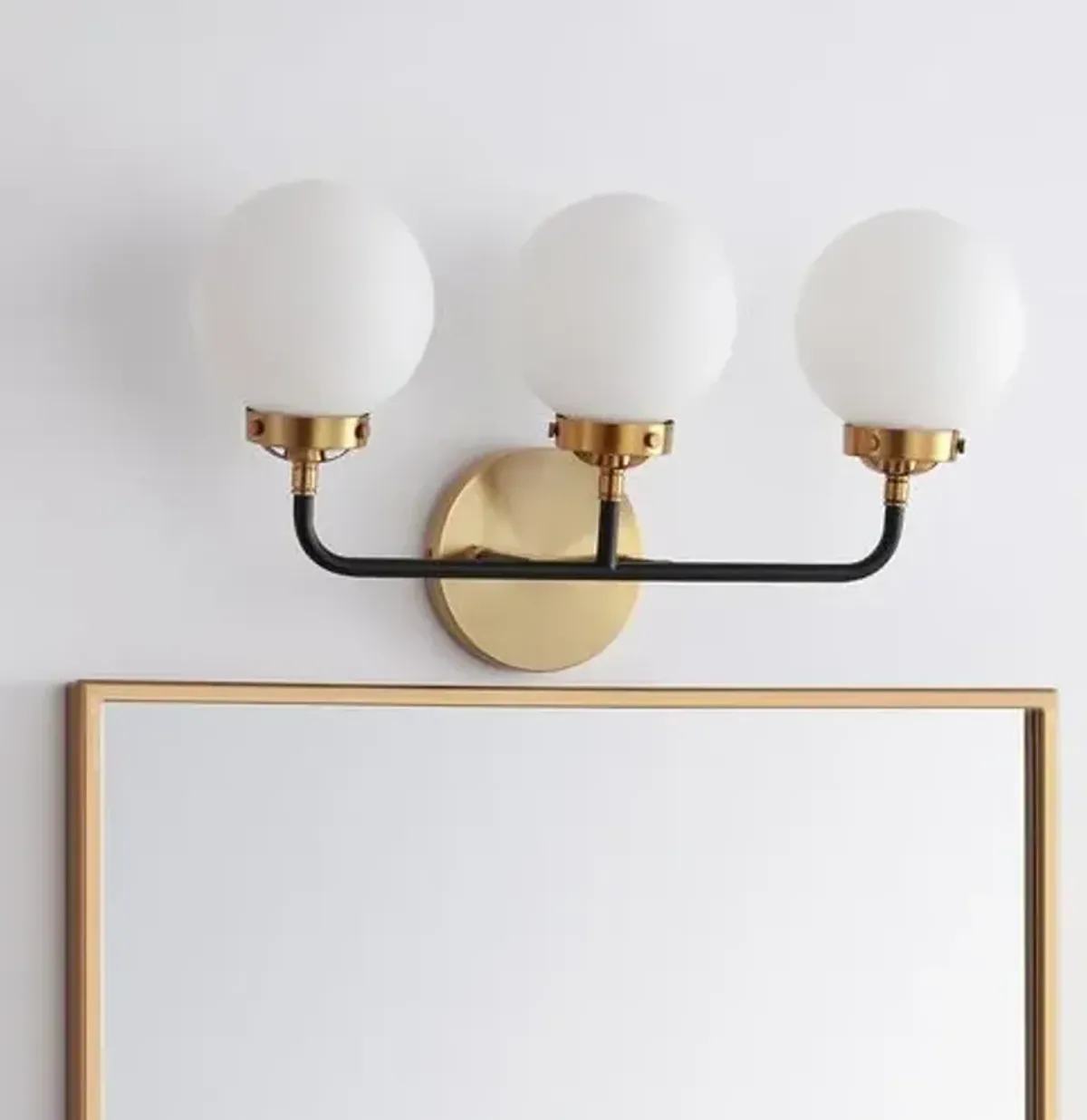 Haldrin Frosted Glass Globe Vanity Wall Sconce - Gold/Black