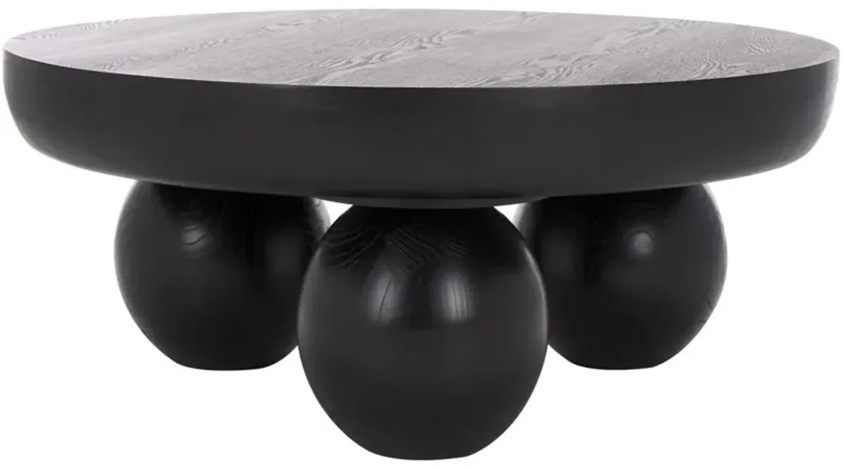 Ivelen 38" Round Elm Sculptural Coffee Table