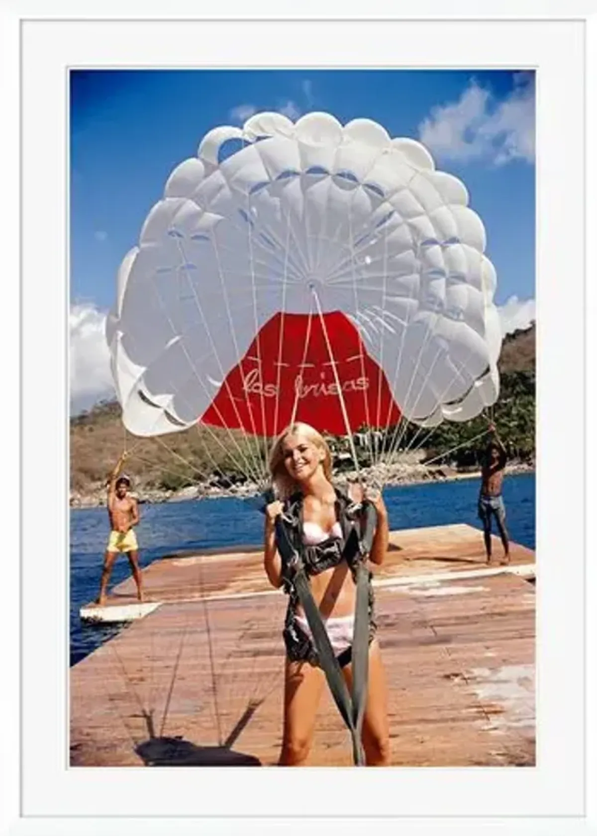 "Paragliding in Acapulco" - Slim Aarons - January 1 - 1968 Photograph - Handcrafted - Red