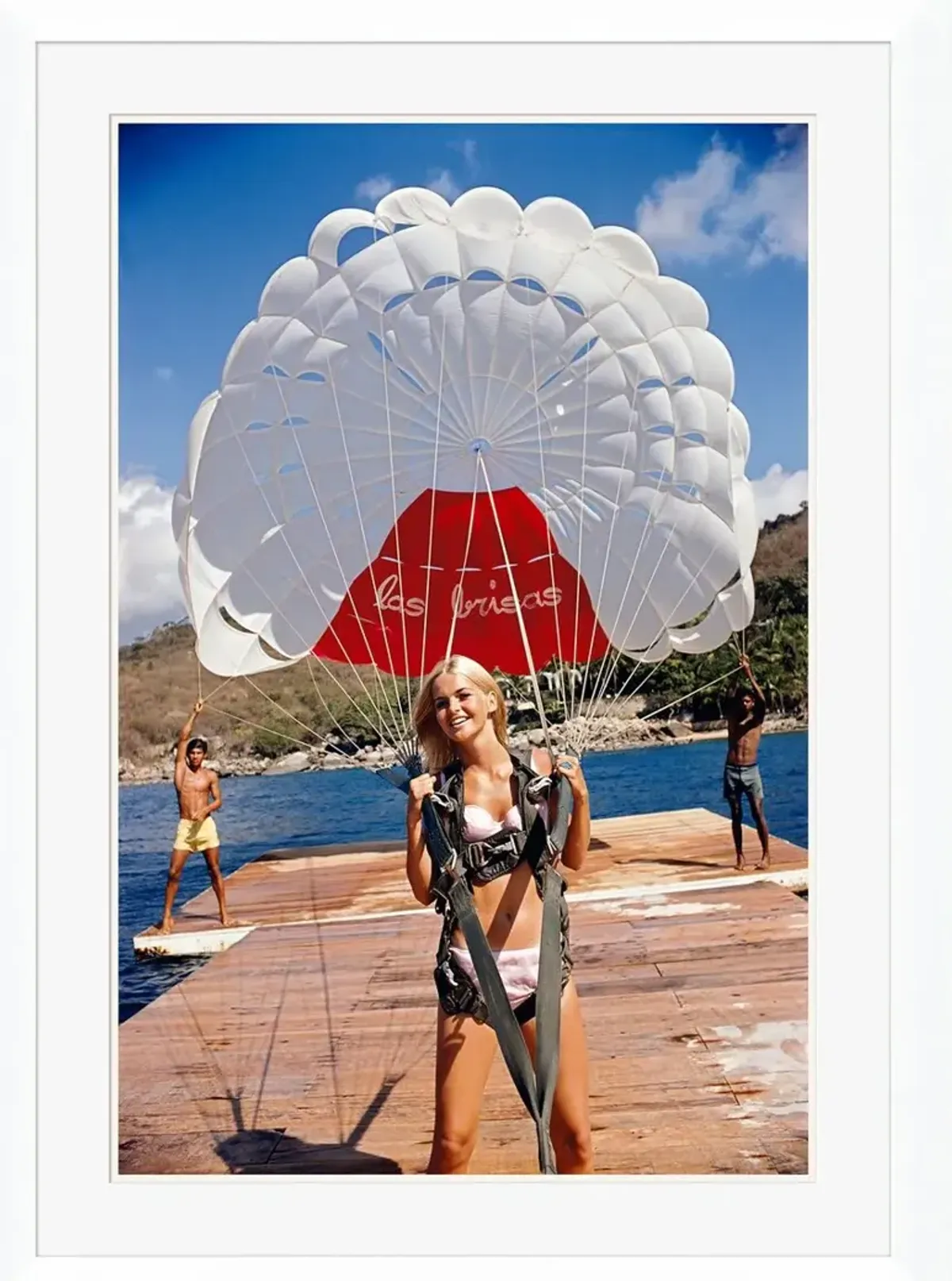 "Paragliding in Acapulco" - Slim Aarons - January 1 - 1968 Photograph - Handcrafted - Red