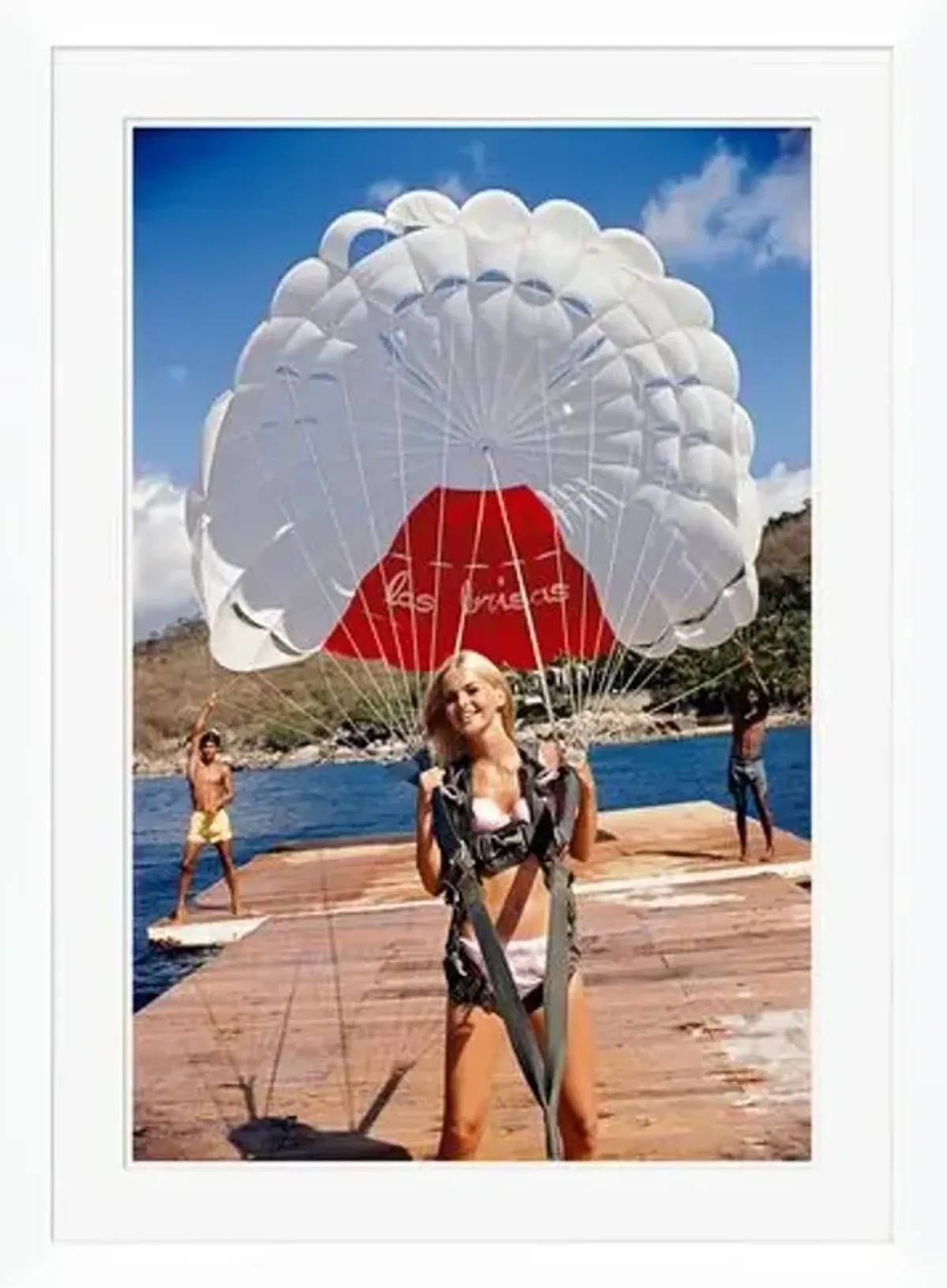 "Paragliding in Acapulco" - Slim Aarons - January 1 - 1968 Photograph - Handcrafted - Red