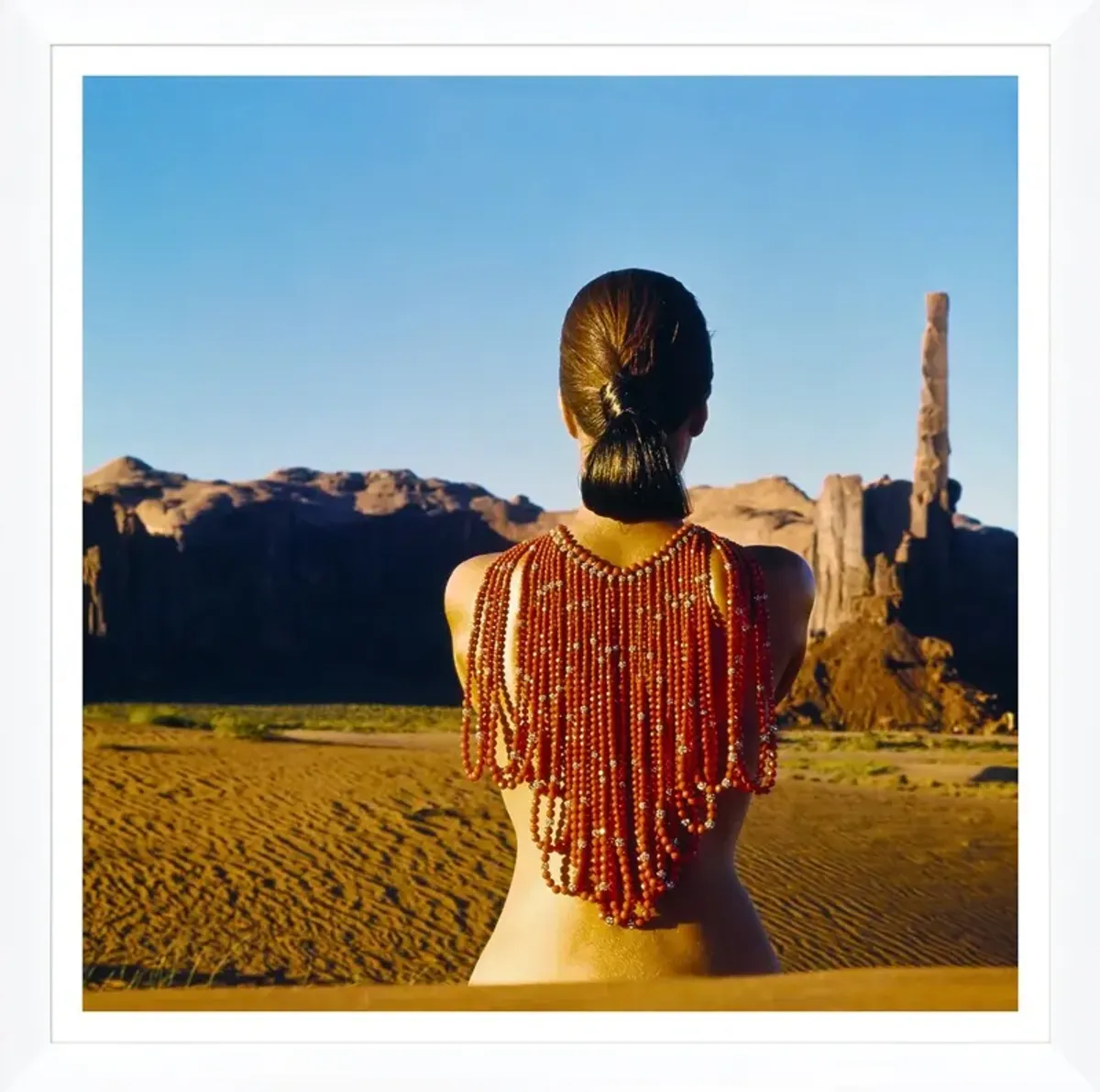 Vogue Magazine, "Model Wearing Red Beads," John Cowan, January 1, 1966 Photograph