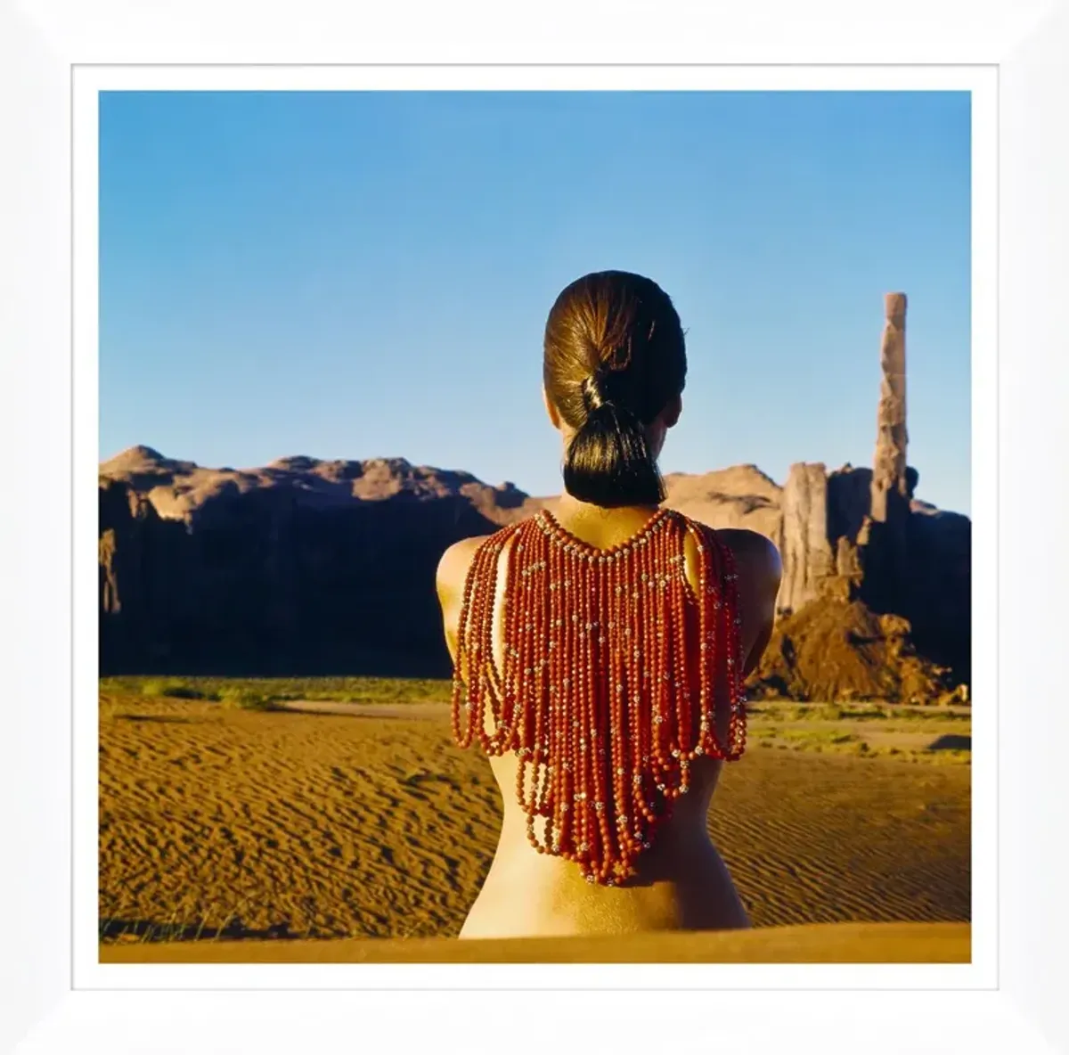 Vogue Magazine, "Model Wearing Red Beads," John Cowan, January 1, 1966 Photograph