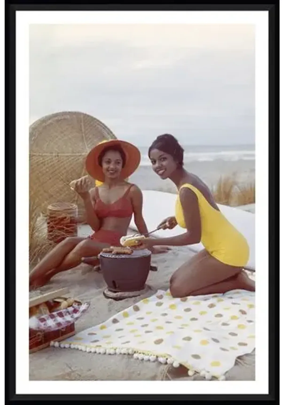 Tom Kelley - Young Women Holding Hot Dog on Beach - Black