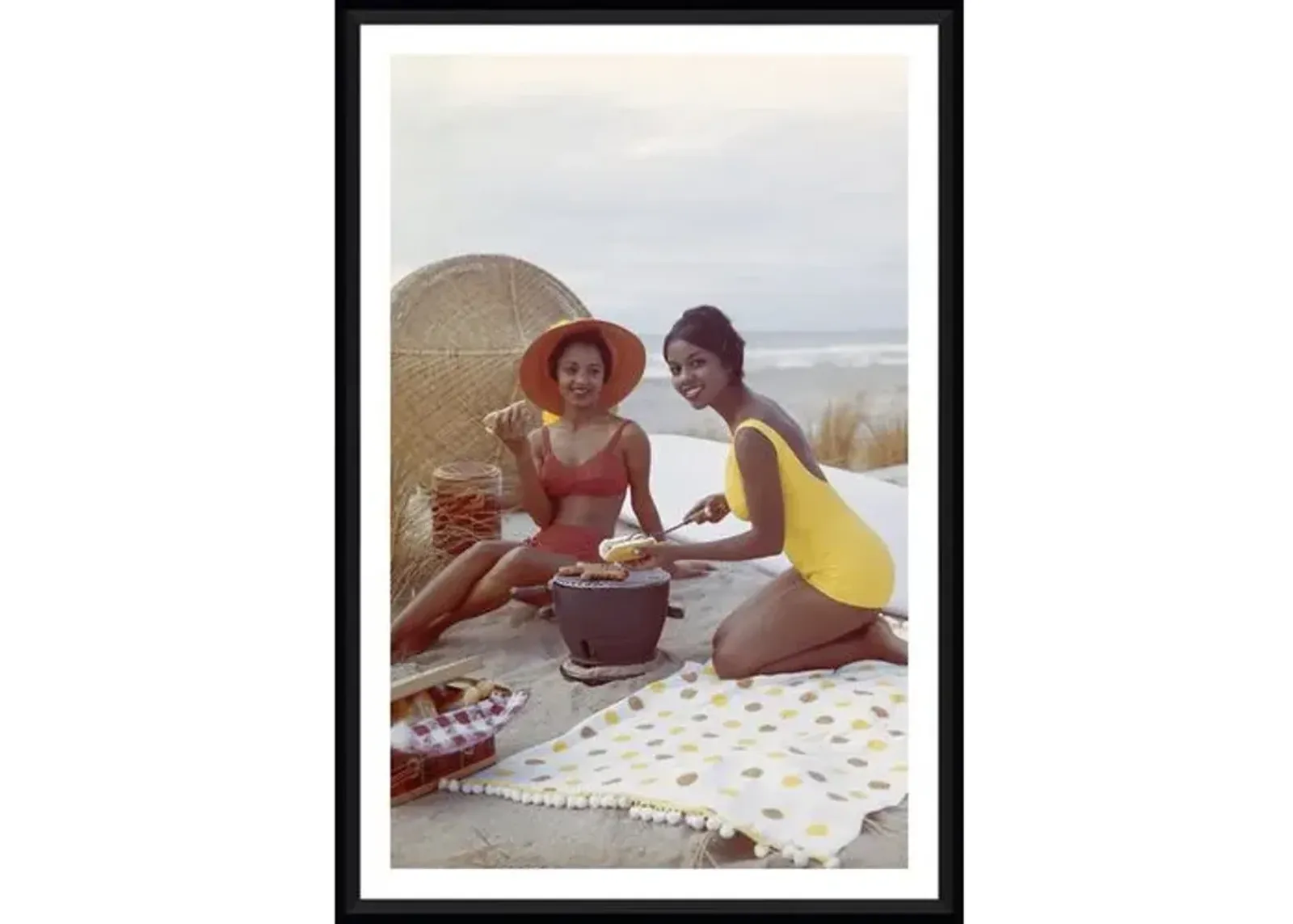 Tom Kelley - Young Women Holding Hot Dog on Beach - Black