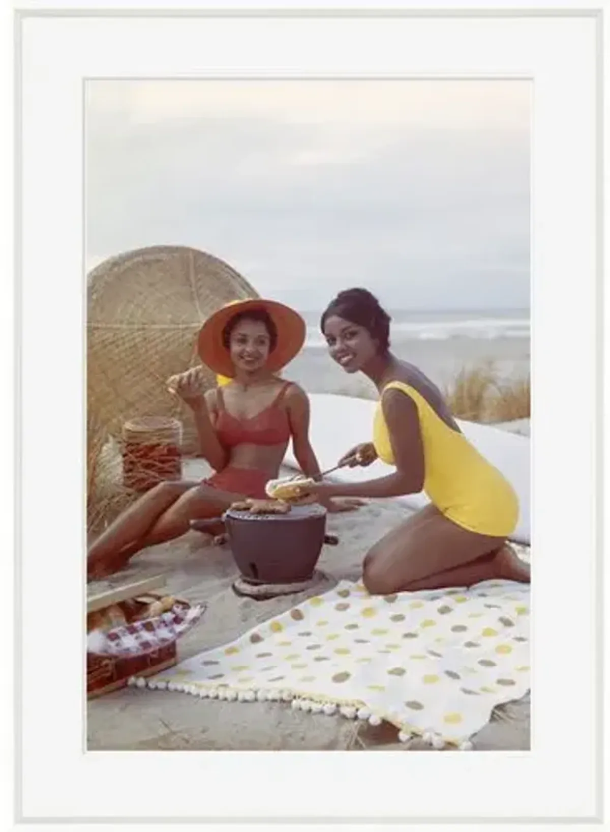 Tom Kelley - Young Women Holding Hot Dog on Beach - White