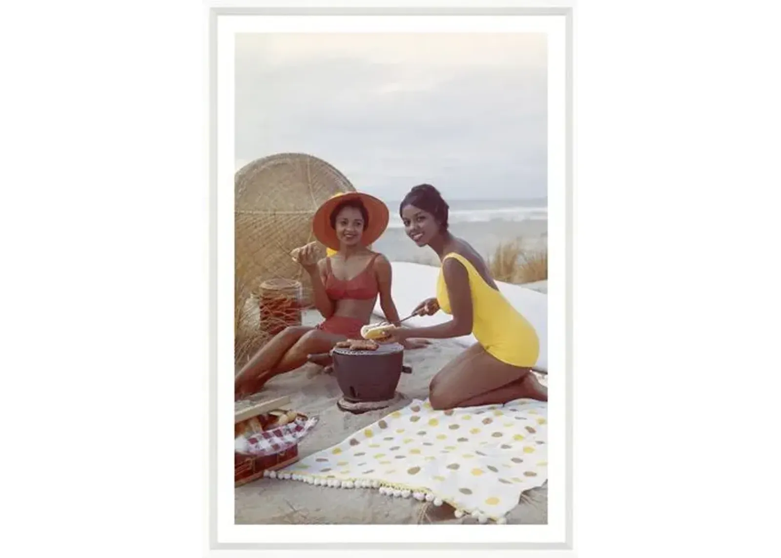 Tom Kelley - Young Women Holding Hot Dog on Beach - White