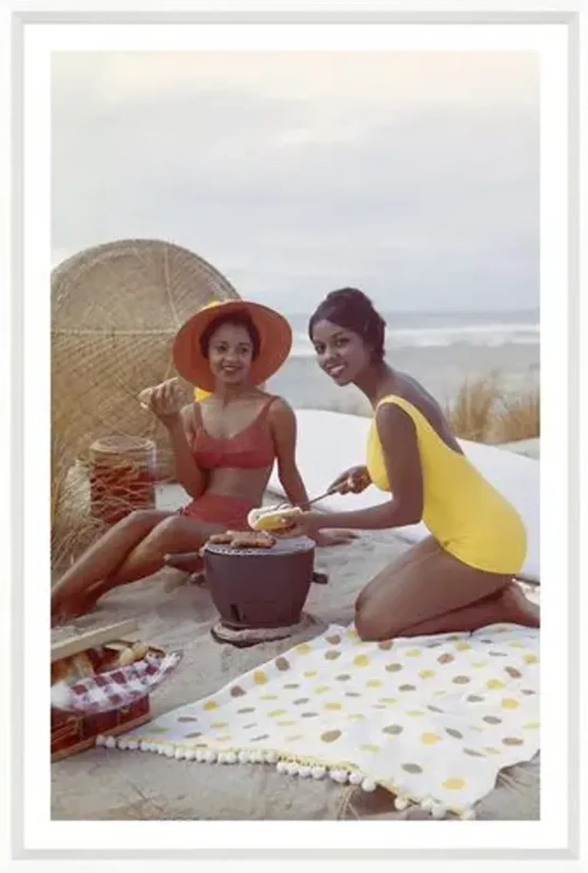 Tom Kelley - Young Women Holding Hot Dog on Beach - White