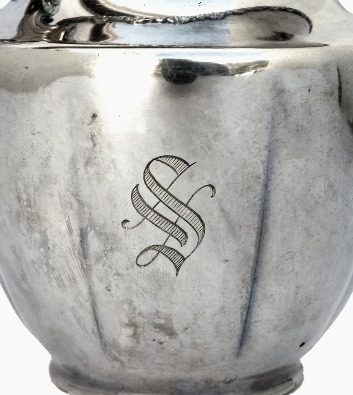 Engraved Silver Pitcher