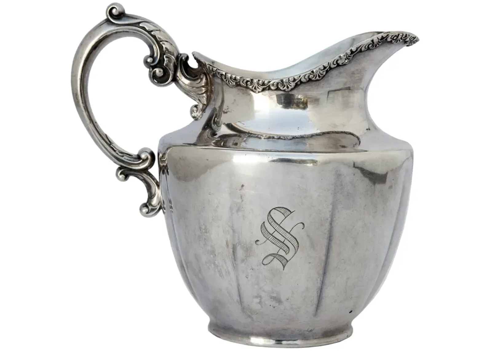 Engraved Silver Pitcher