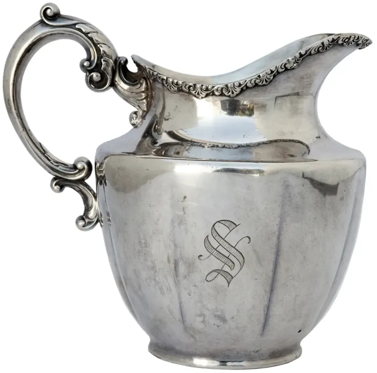 Engraved Silver Pitcher