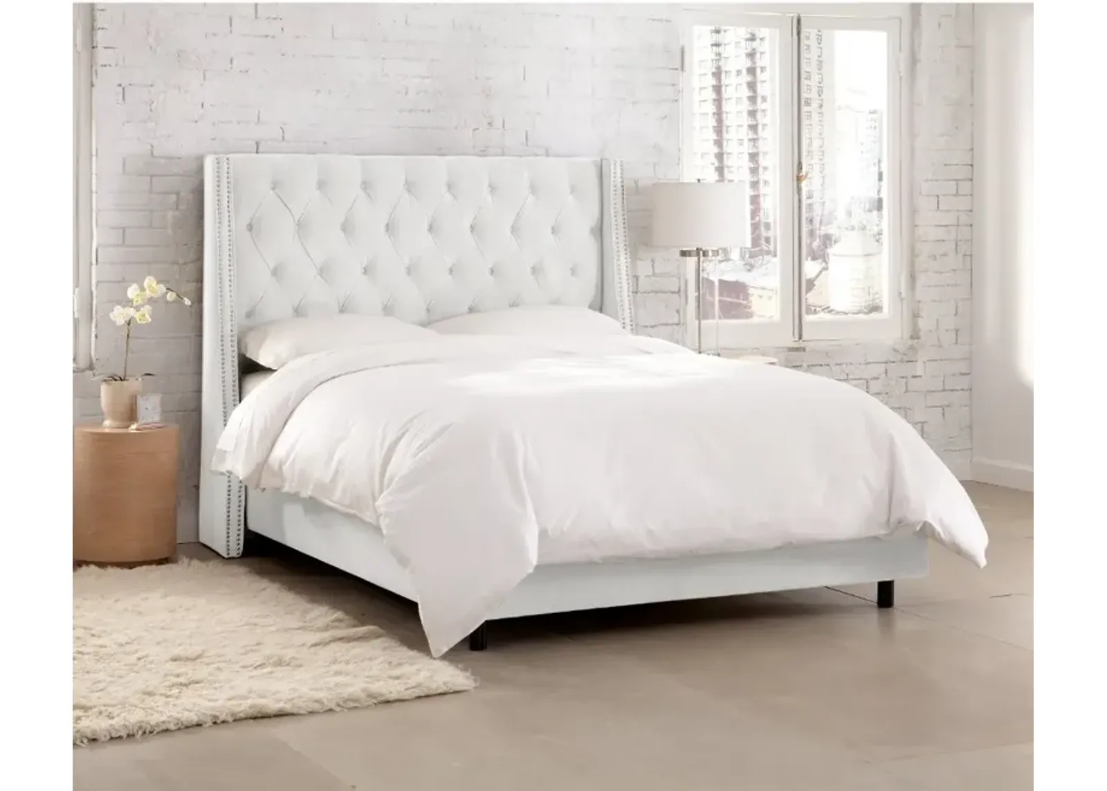 Riley Velvet White Flared Wingback California King Bed - Skyline...