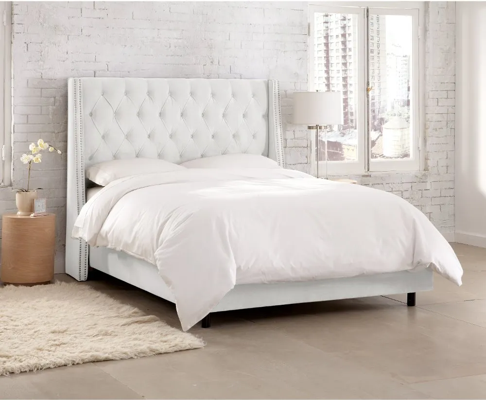 Riley Velvet White Flared Wingback California King Bed - Skyline...