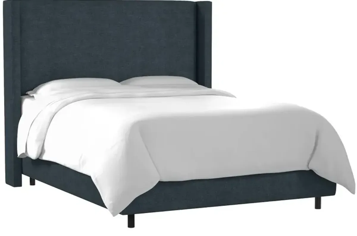 Penelope Navy Upholstered Wingback California King Bed - Skyline Furniture