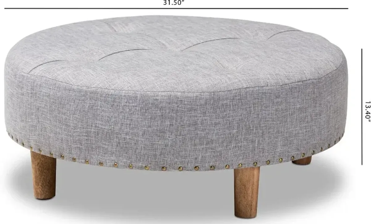 Vinet Gray Upholstered Round Cocktail Ottoman