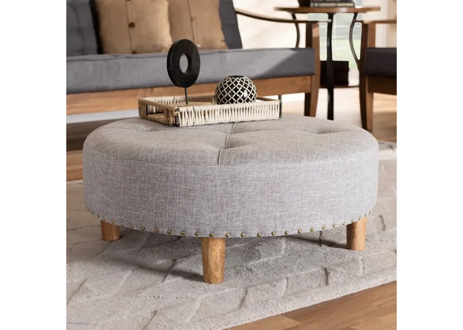 Vinet Gray Upholstered Round Cocktail Ottoman