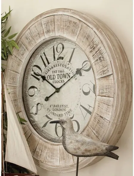 Ivy Collection Canandaigua Wall Clock in Brown by UMA Enterprises