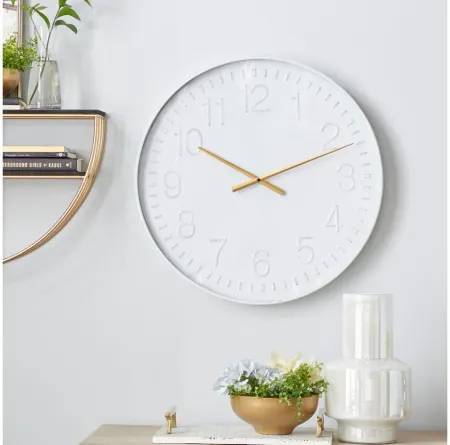 Ivy Collection Dragoon Wall Clock in White by UMA Enterprises