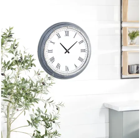 Ivy Collection Spritina Wall Clock in White by UMA Enterprises