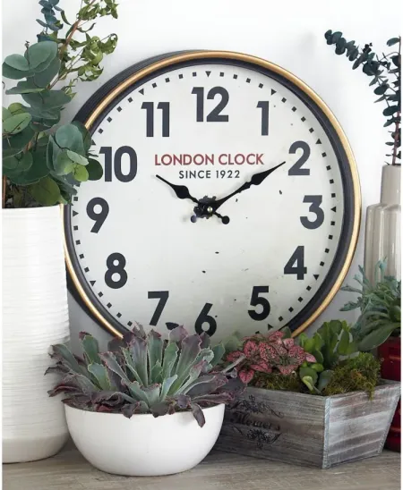 Ivy Collection Lubic Wall Clock in White by UMA Enterprises