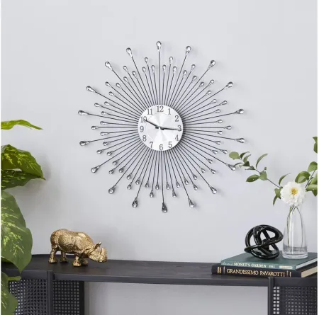 Ivy Collection Wonderbolt Wall Clock in Silver by UMA Enterprises
