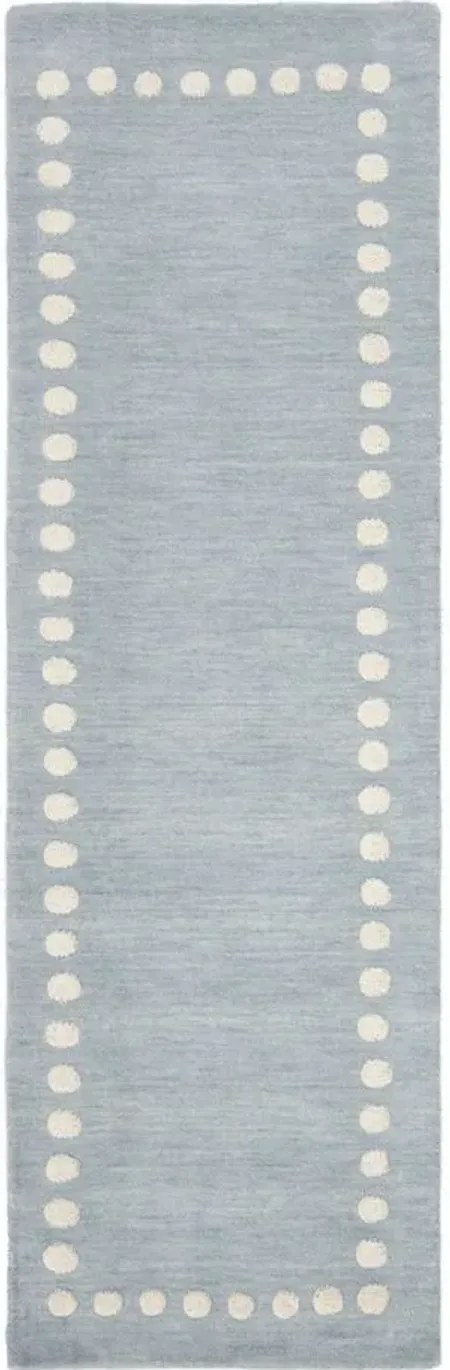 Finnian Kid's Area Rug in Blue & Ivory by Safavieh