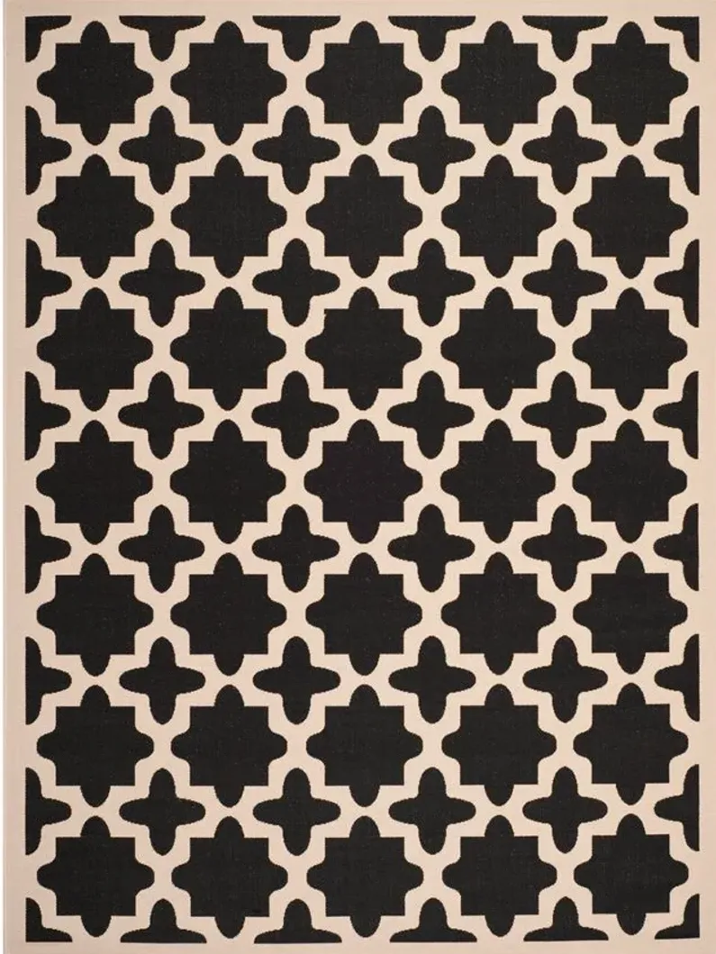 Courtyard Tile Indoor/Outdoor Area Rug in Black & Beige by Safavieh