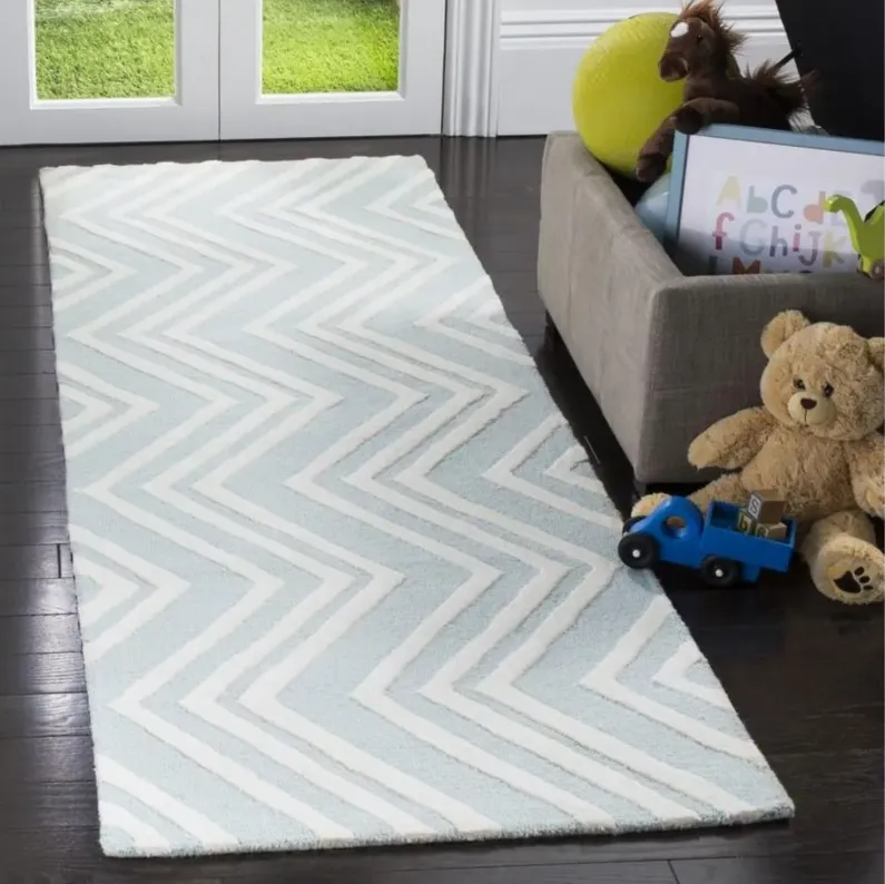 Santana Kid's Area Rug in Mint & Ivory by Safavieh